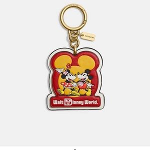 NWT Retro Bag Charm Disney x Coach Mickey Minnie hand holding Walt Disney World
